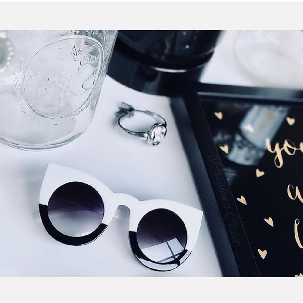 Black and white oversized cat eye sunglasses